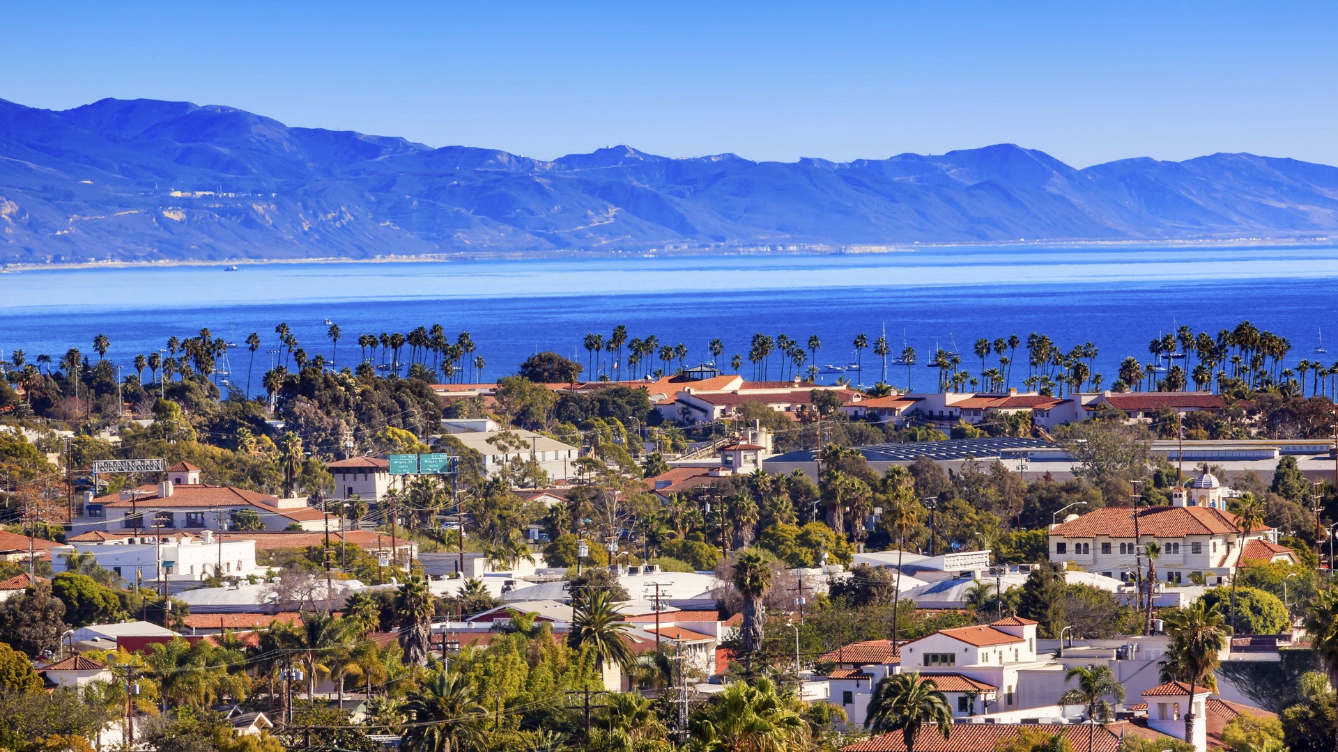 Oceanview landscape with mountains in background