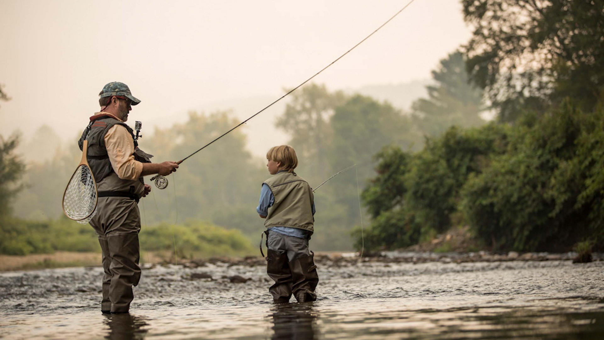 Man fly fishing in river